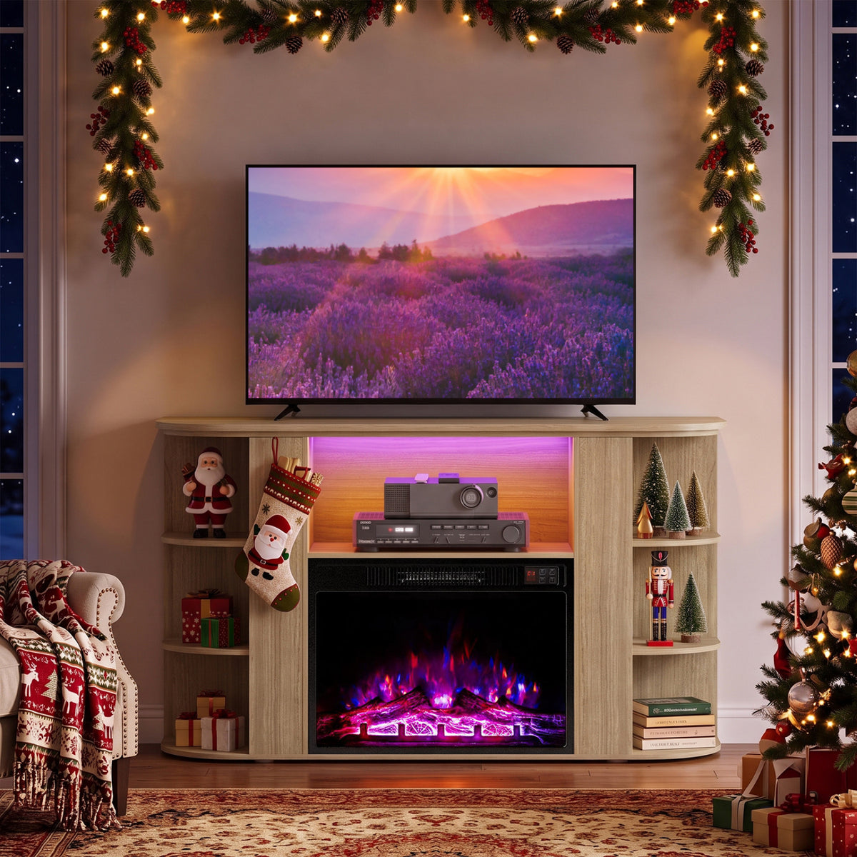 Fireplace TV stand decorated for Christmas, with purple flames and pink center lighting beneath a television.