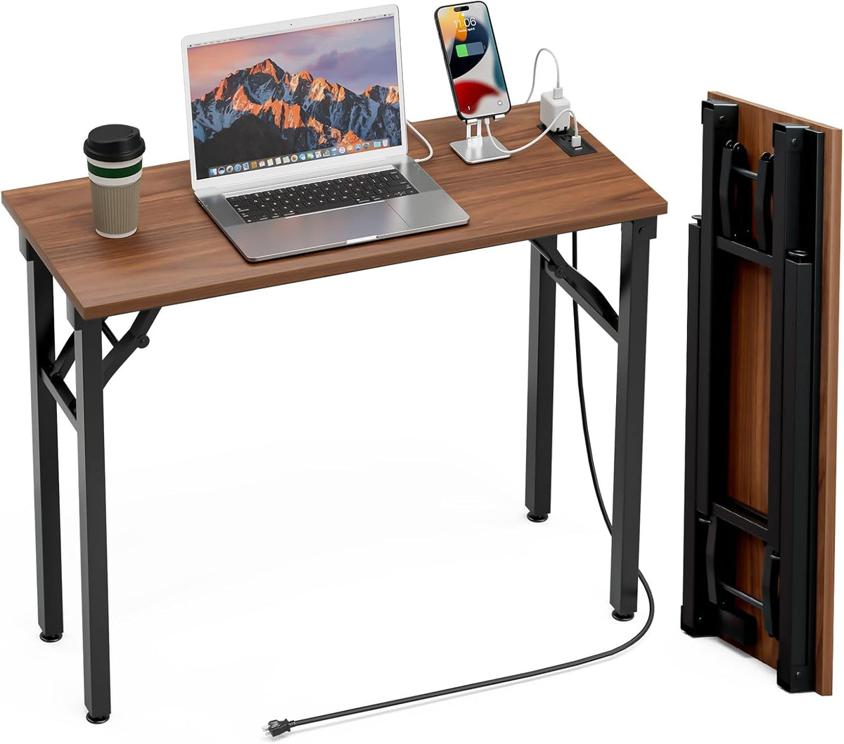 Three-quarter view of brown wood-top folding desk with black steel legs, laptop, phone and folded panel standing upright