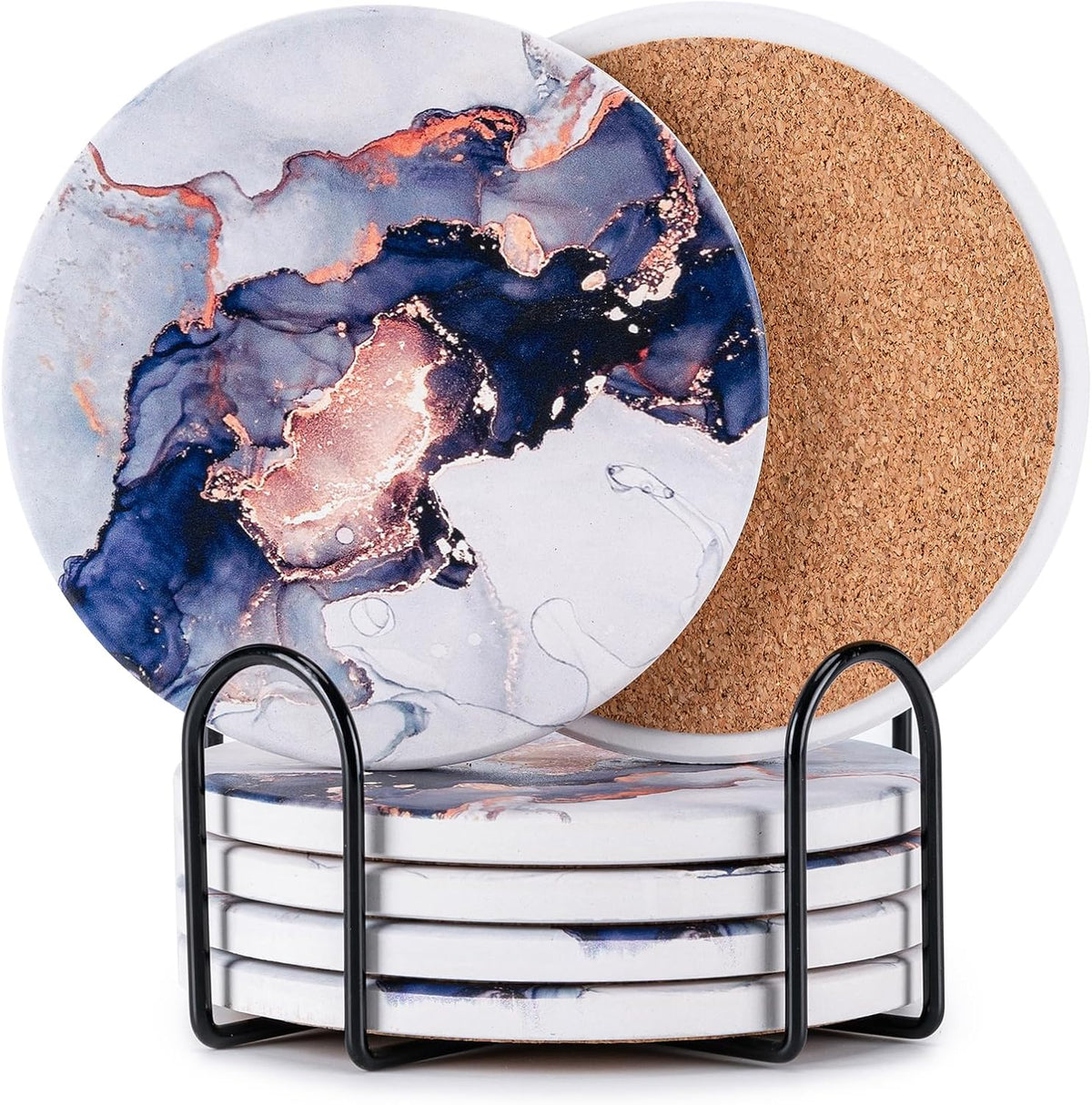Stack of round marble-pattern coasters with deep blue and rose-gold accents in a black metal holder, cork backs visible