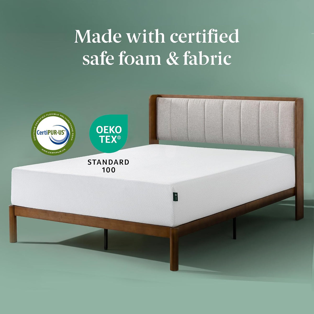 White mattress on a bed frame with CertiPUR‑US and OEKO‑TEX logos displayed on a green backdrop.