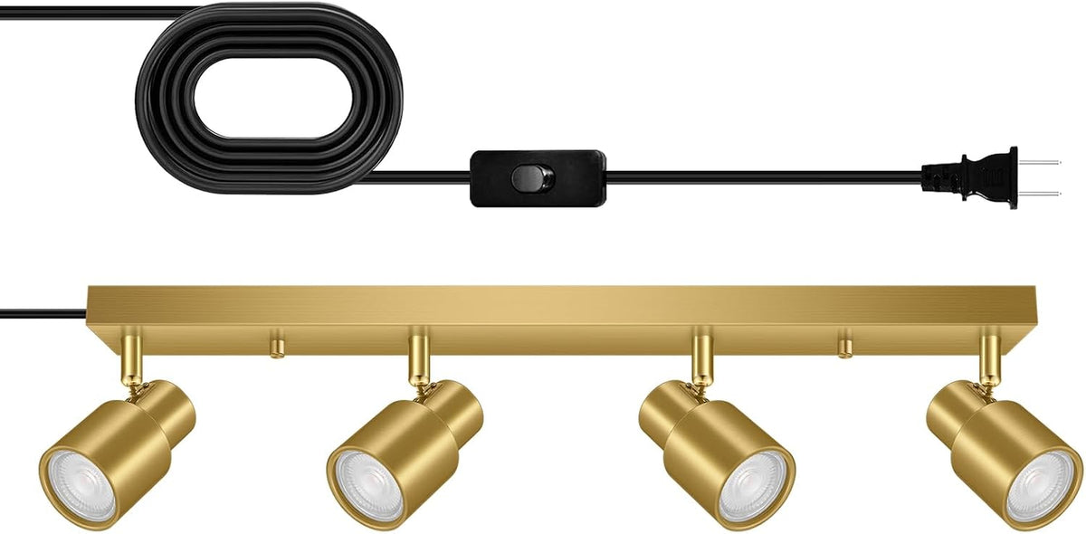 Brushed gold four-light track fixture with four adjustable cylinder heads and a coiled black cord with inline switch and
