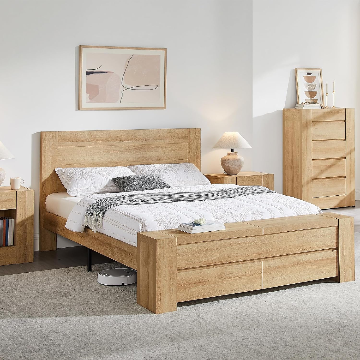 Front view of a light oak platform bed with headboard and low storage bench at foot in a staged bedroom.
