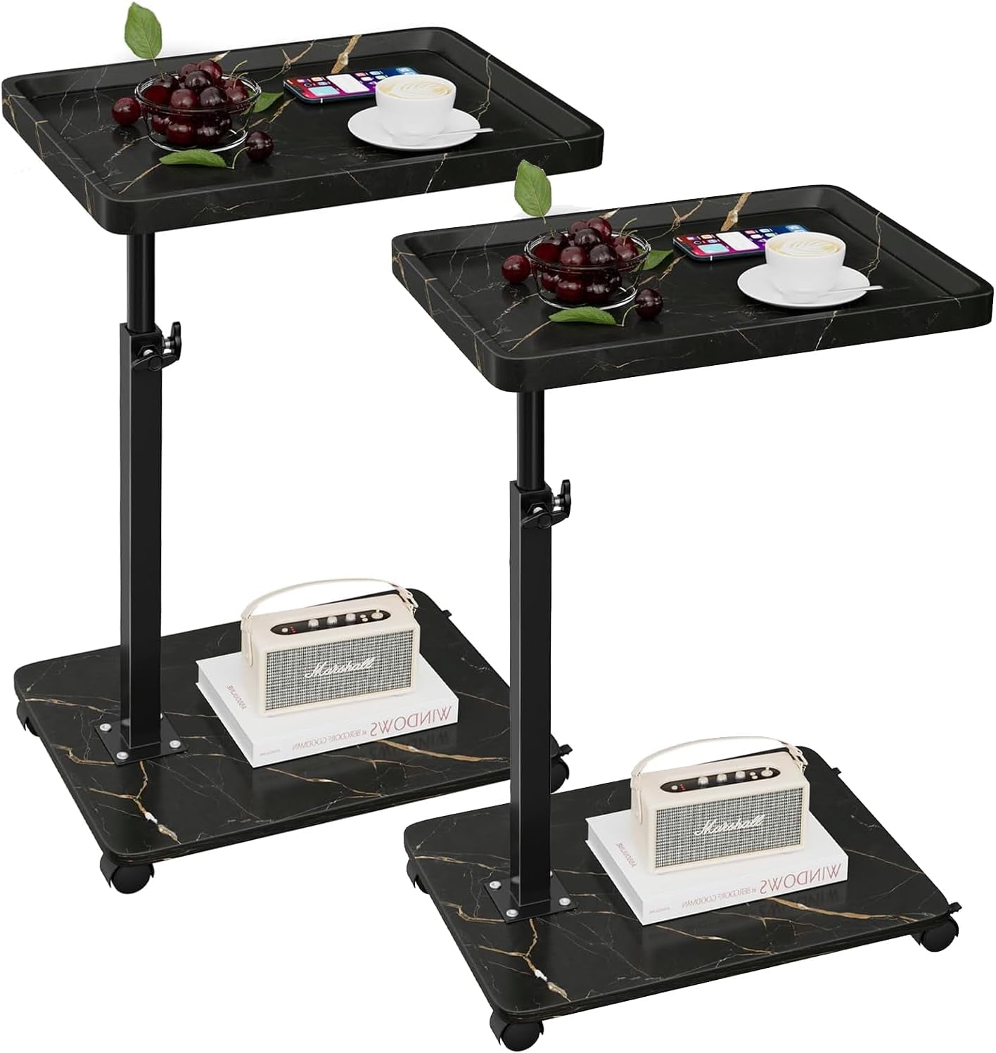 Two black marble-pattern C-shaped side tables with black stems and caster bases.