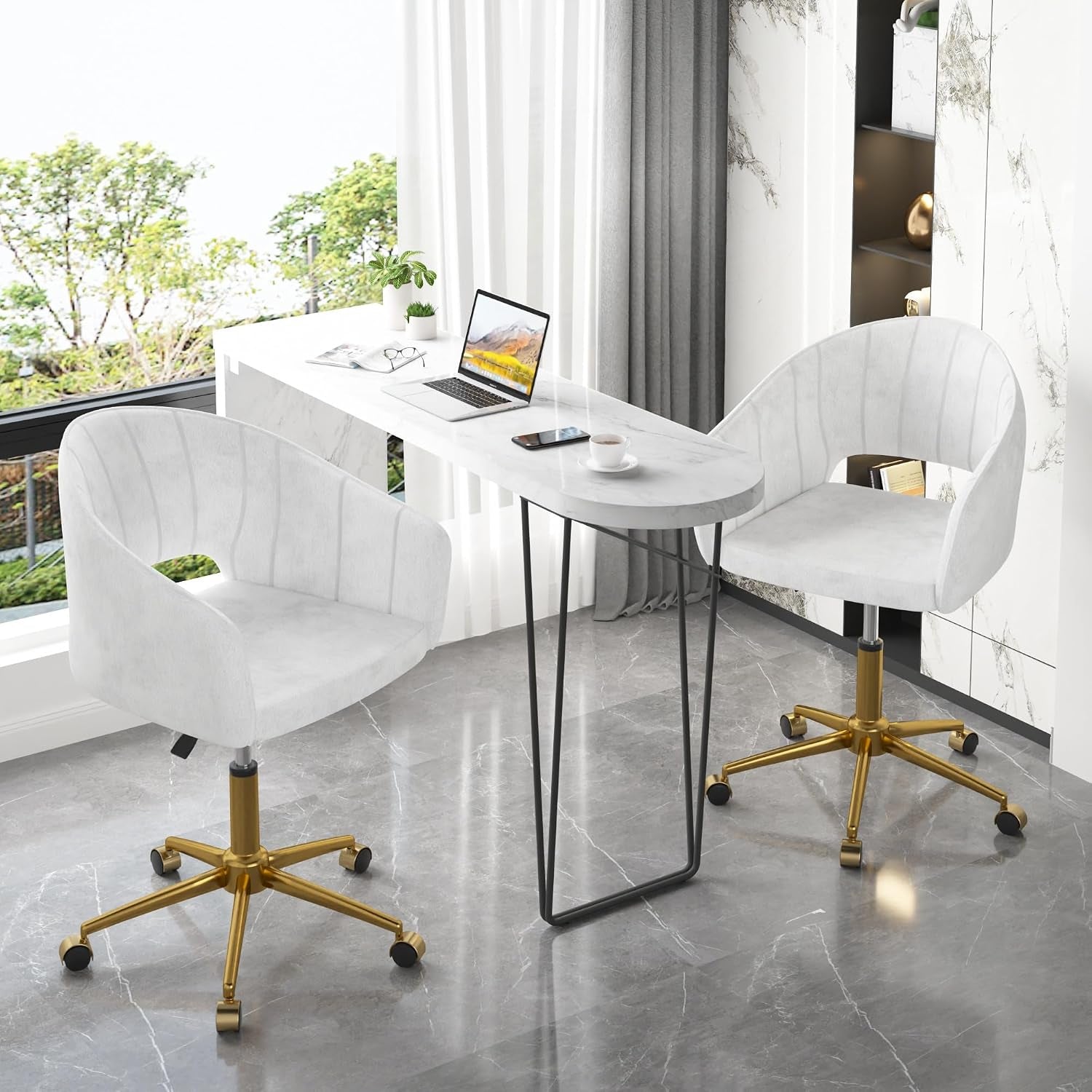 Two pearl-white velvet swivel chairs with gold five-star bases beside a slim white desk.