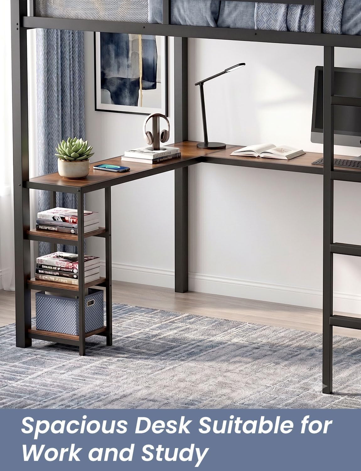 Corner of an L-shaped wood desk beneath a loft bed, with a desk lamp, headphones, plant and neatly stacked books.