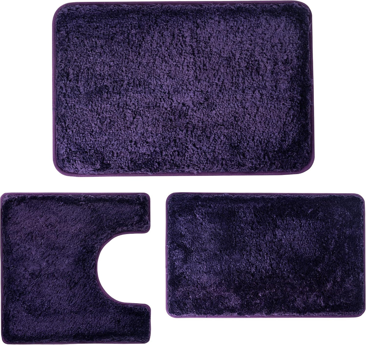 Top-down view of a three-piece deep purple bath rug set laid flat.