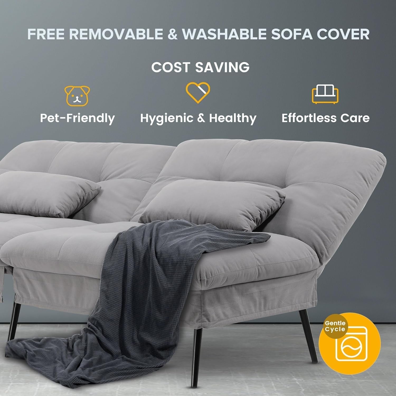 Three-seat grey fabric futon with two loose cushions, black tapered legs and a dark grey throw draped over the seat.
