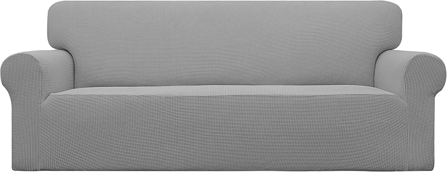 Front view of a two-cushion loveseat covered in a dark gray textured slipcover