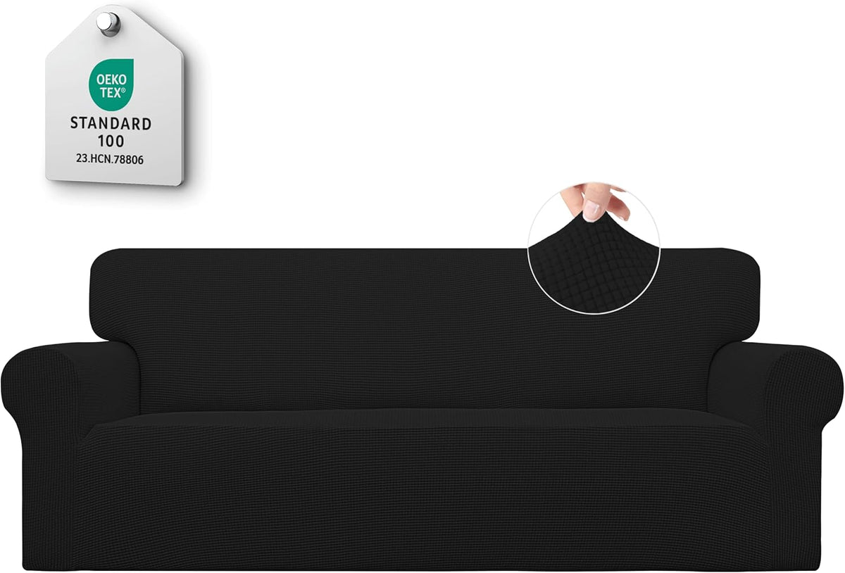 Front view of a black loveseat cover with an OEKO-TEX hanging label at top left and a round fabric close-up at top right.
