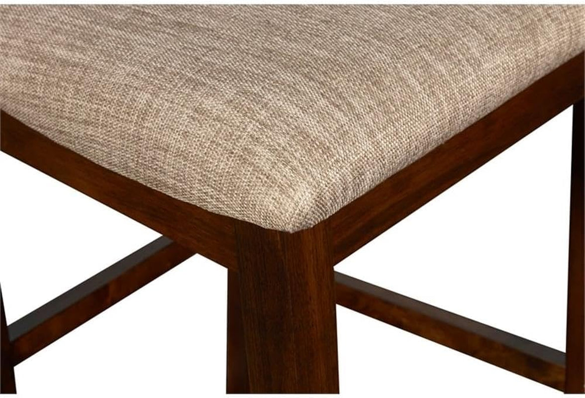 Close-up detail of the padded beige fabric seat and the dark wood corner and stretcher support.
