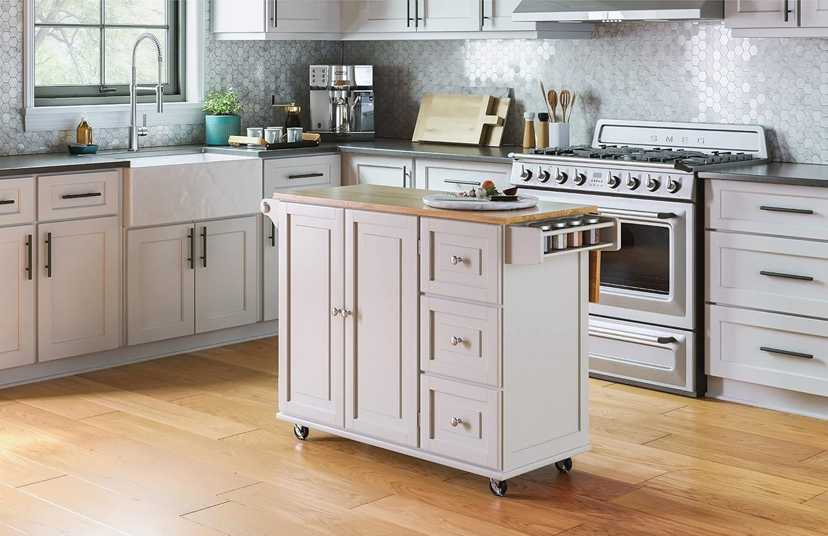 Off-white kitchen island cart with hardwood top in a modern kitchen setting, three-quarter front view on casters
