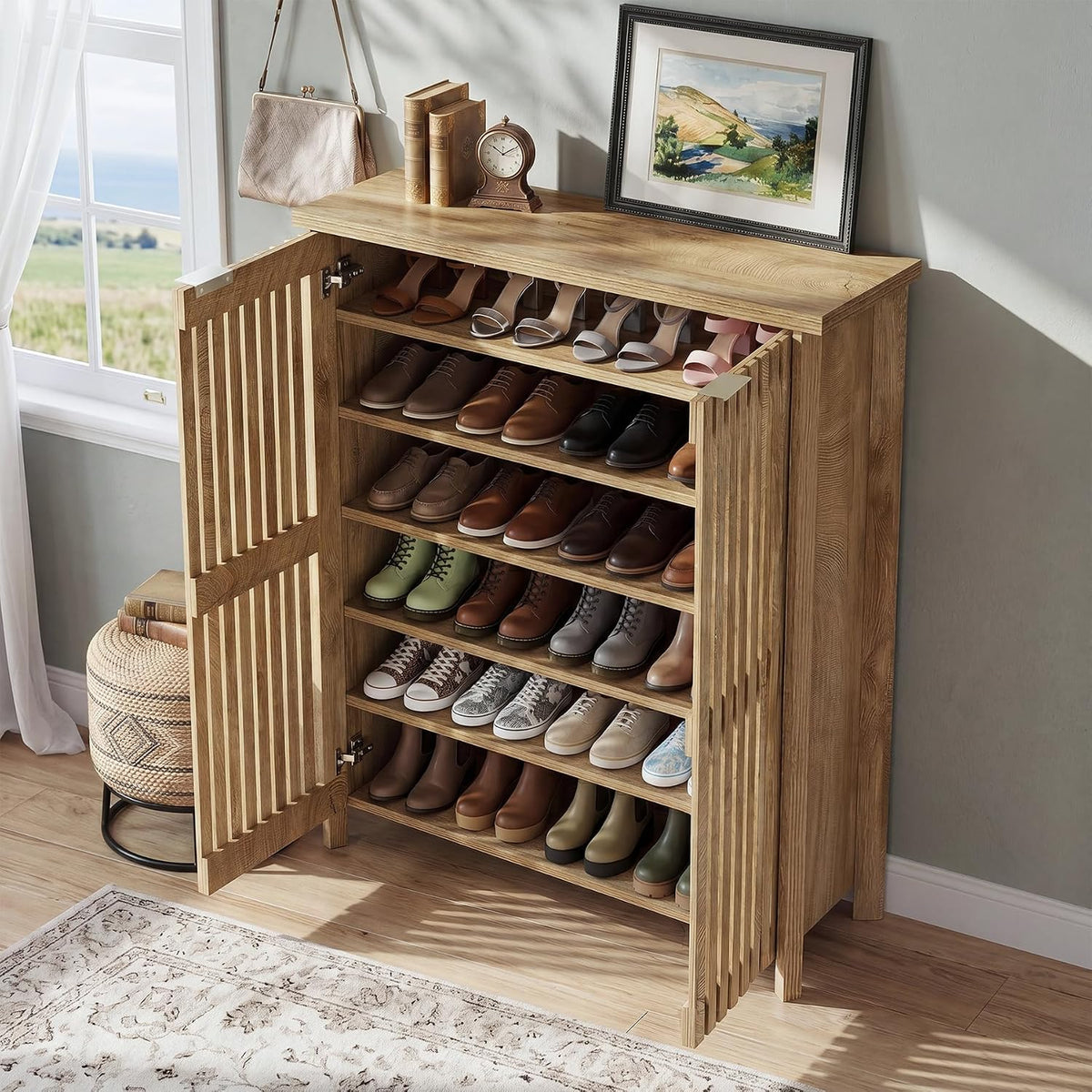 Open top-down view showing six interior shelves filled with sneakers, heels, and boots