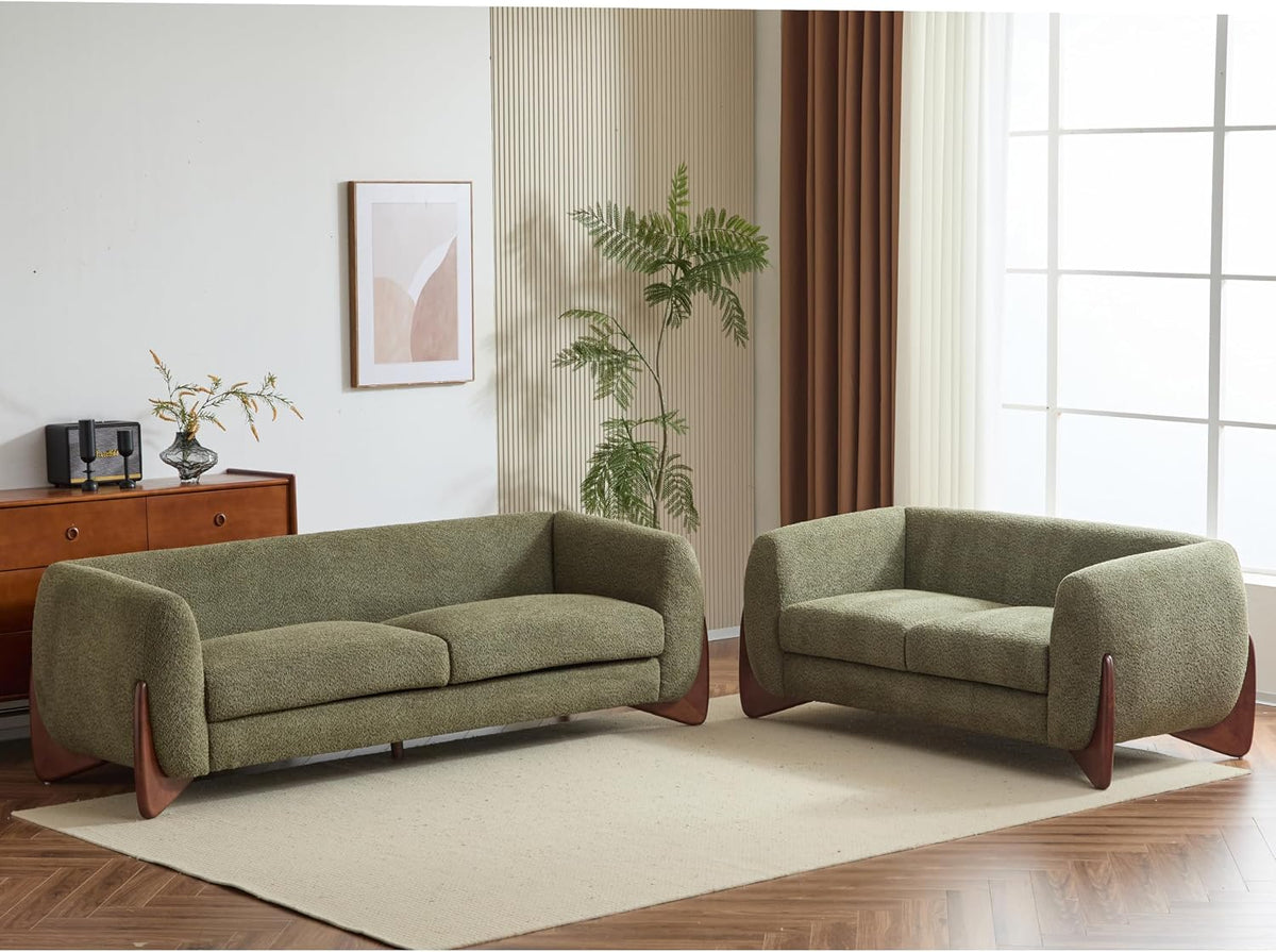 Living room with olive-green three-seater sofa and matching loveseat on rug