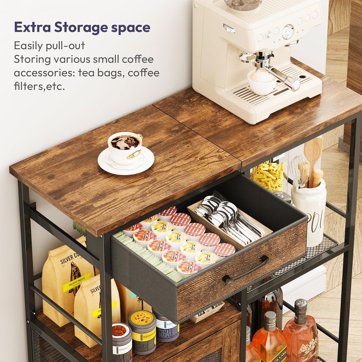 Close view of the buffet's top and an open drawer filled with coffee pods and utensils