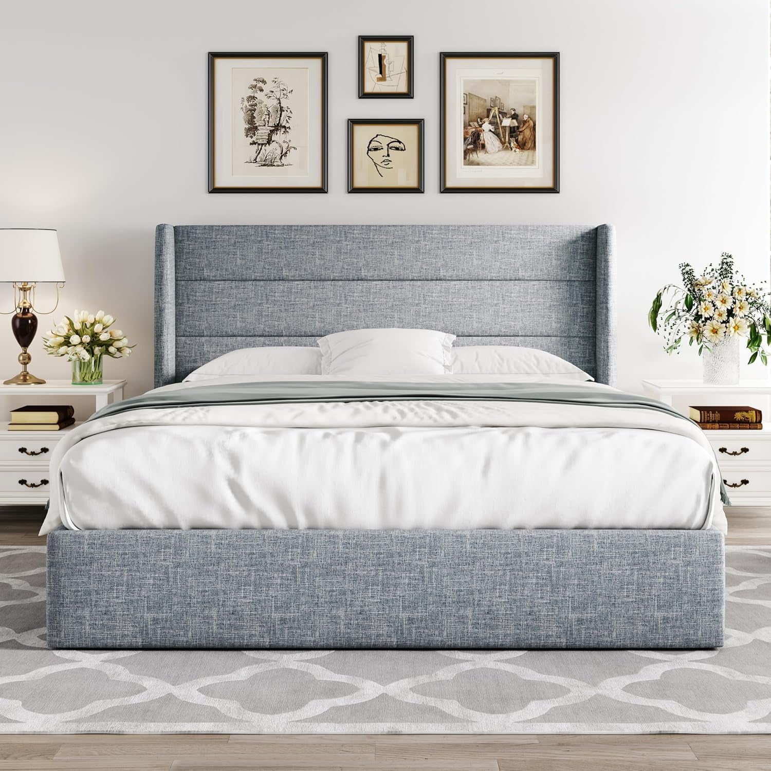Front-facing view of the upholstered wingback headboard and low footboard in a styled bedroom setting.
