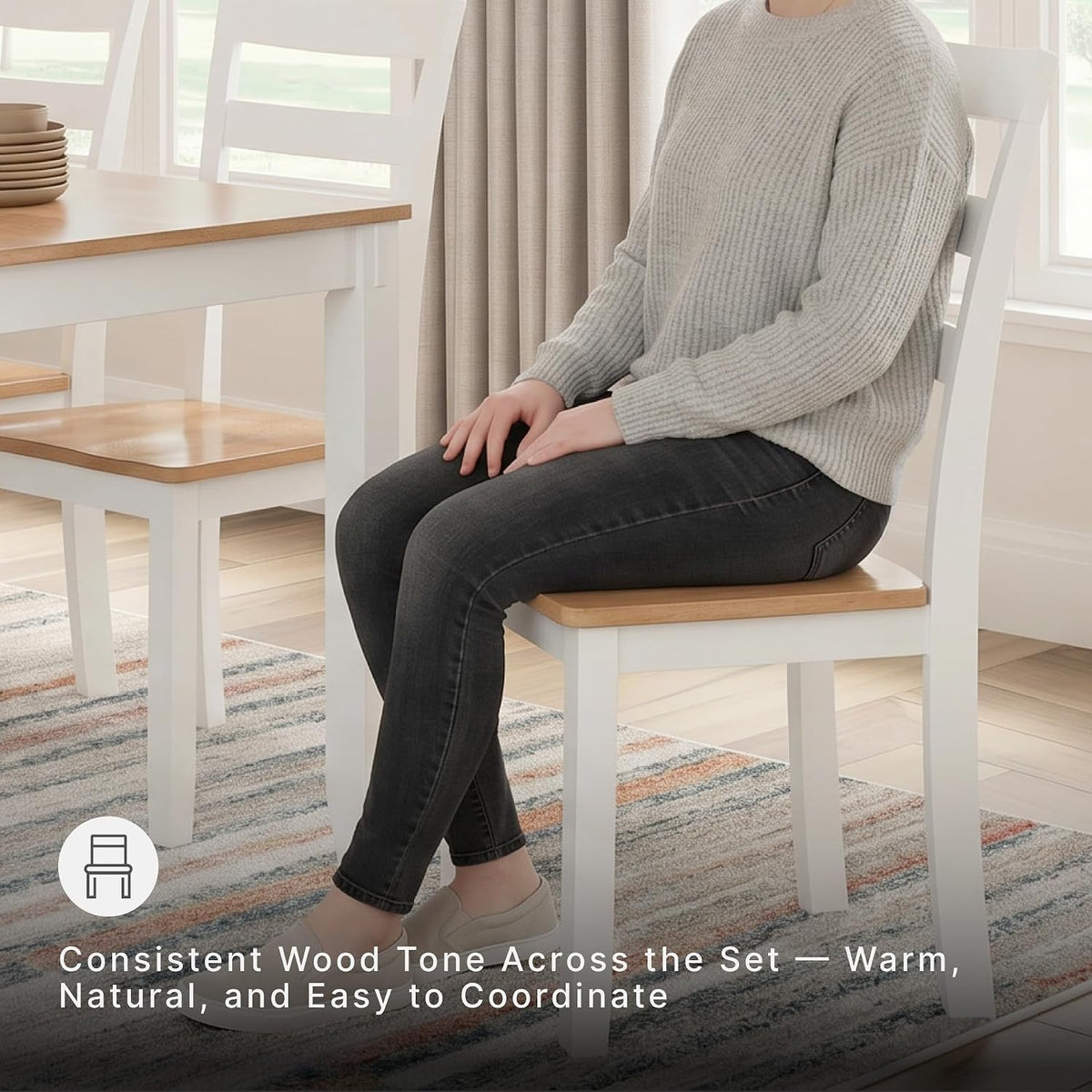 Side view of a person seated on a contoured mango veneer chair with white frame, highlighting chair back and seat profile