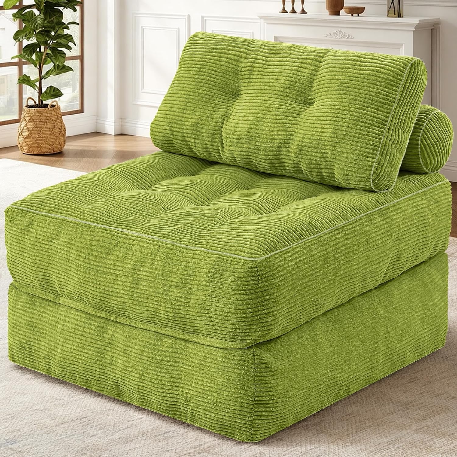 Green corduroy single folding sofa chair angled front view with back pillow and cylindrical bolster