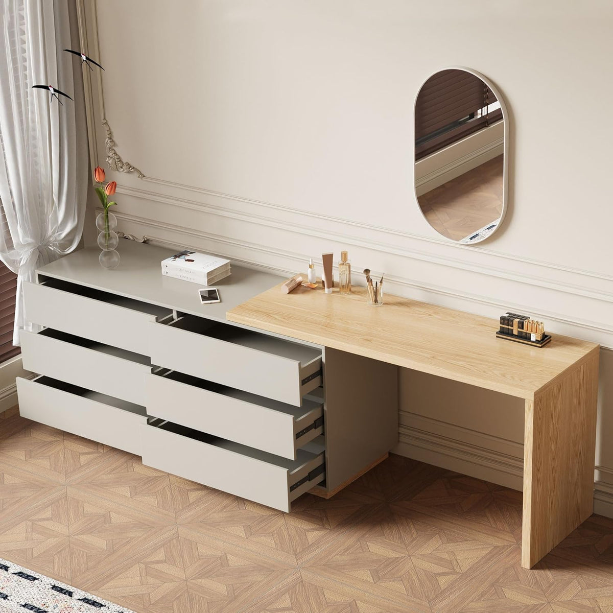 Light beige L-shaped dresser with six open drawers and a wood-top desk against a cream wall with mirror