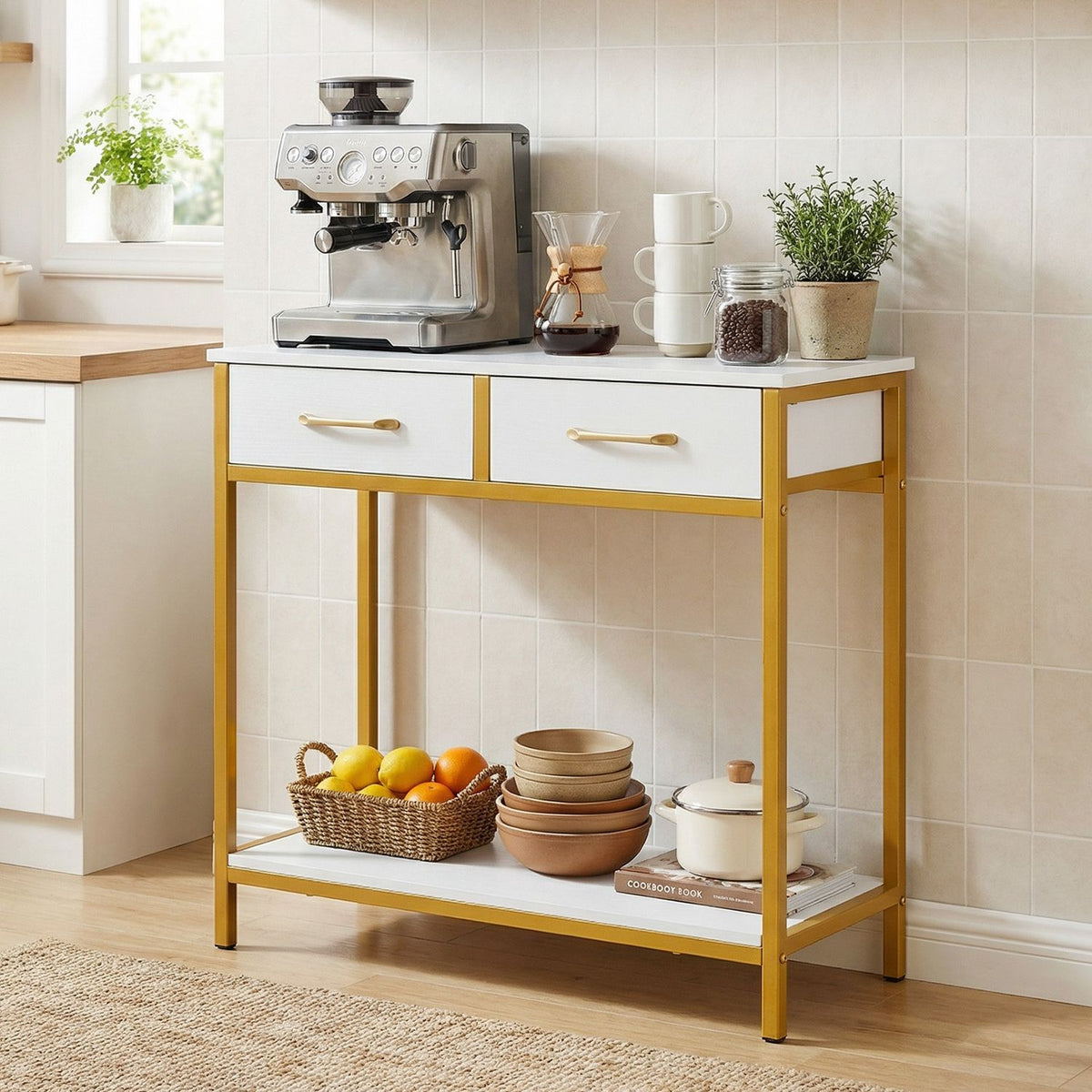 White console table with gold-tone frame used as a coffee station