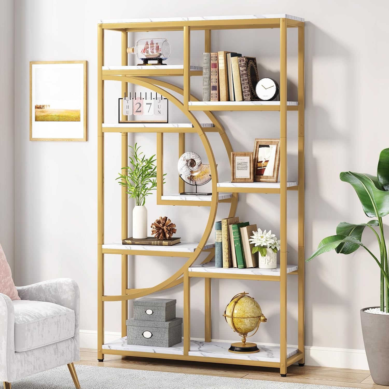 Gold half-moon bookshelf styled with books and decor, straight front view showing staggered shelves
