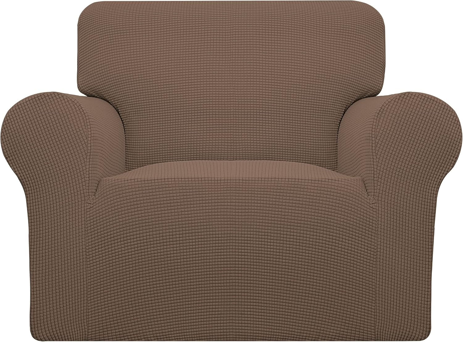 Front view of an armchair dressed in a warm brown waffle-textured slipcover, showing seat and arm contours.