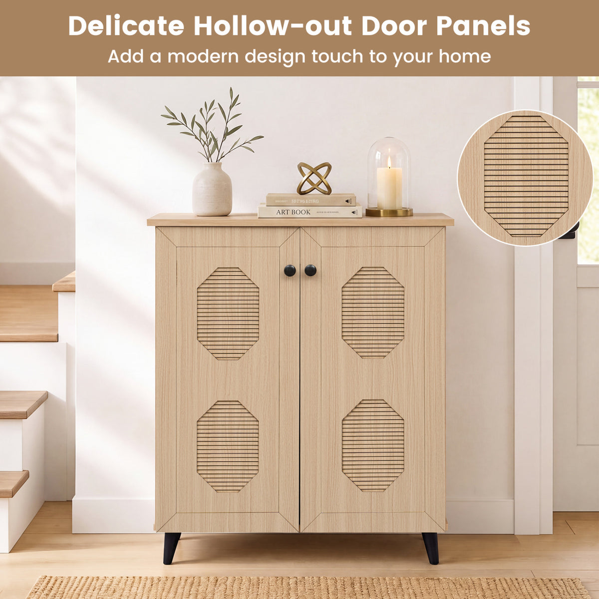 Closed light wood cabinet with four geometric cutout panels, black knobs, and tapered feet against a bright wall.