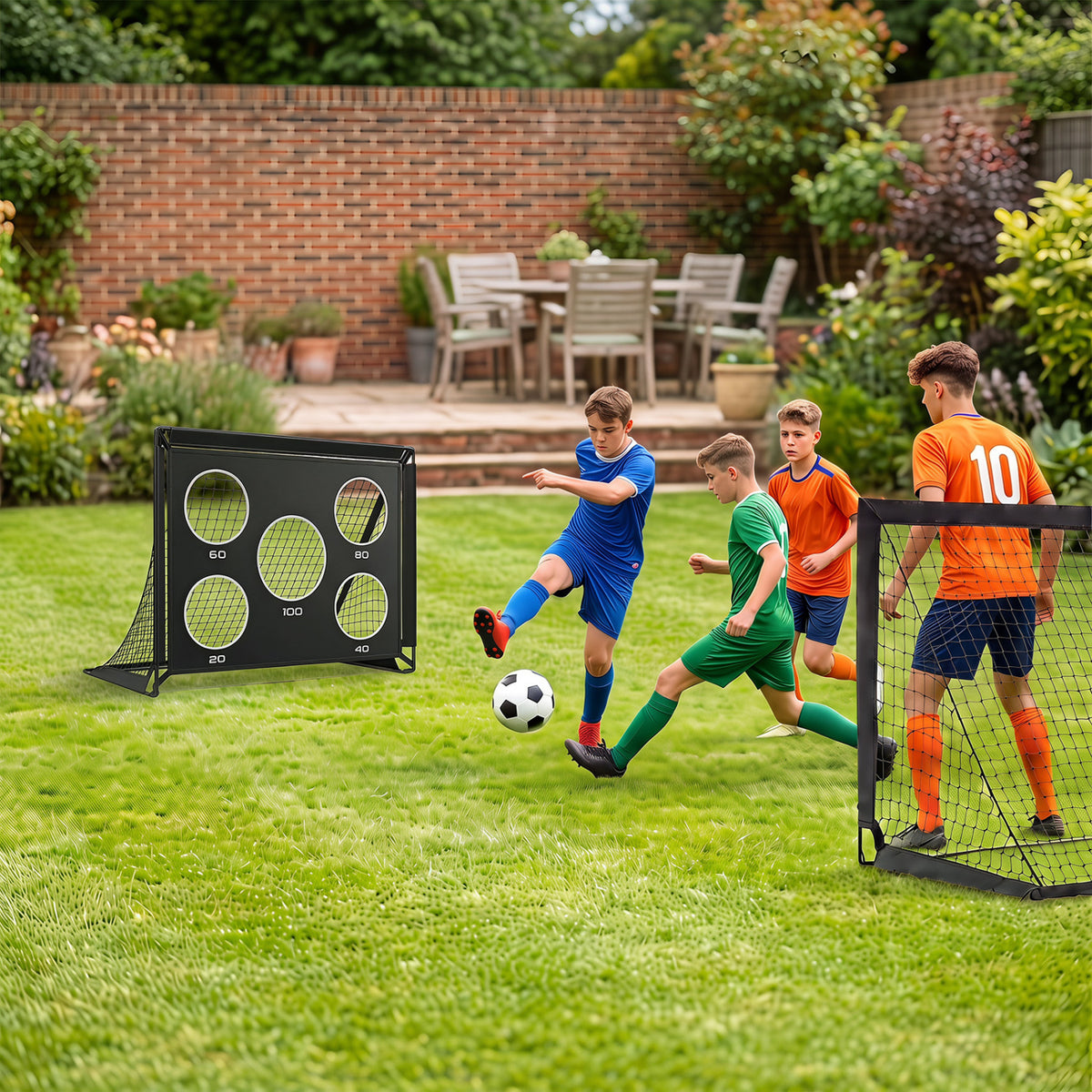 Black soccer goals with target cloth on a lawn as children play