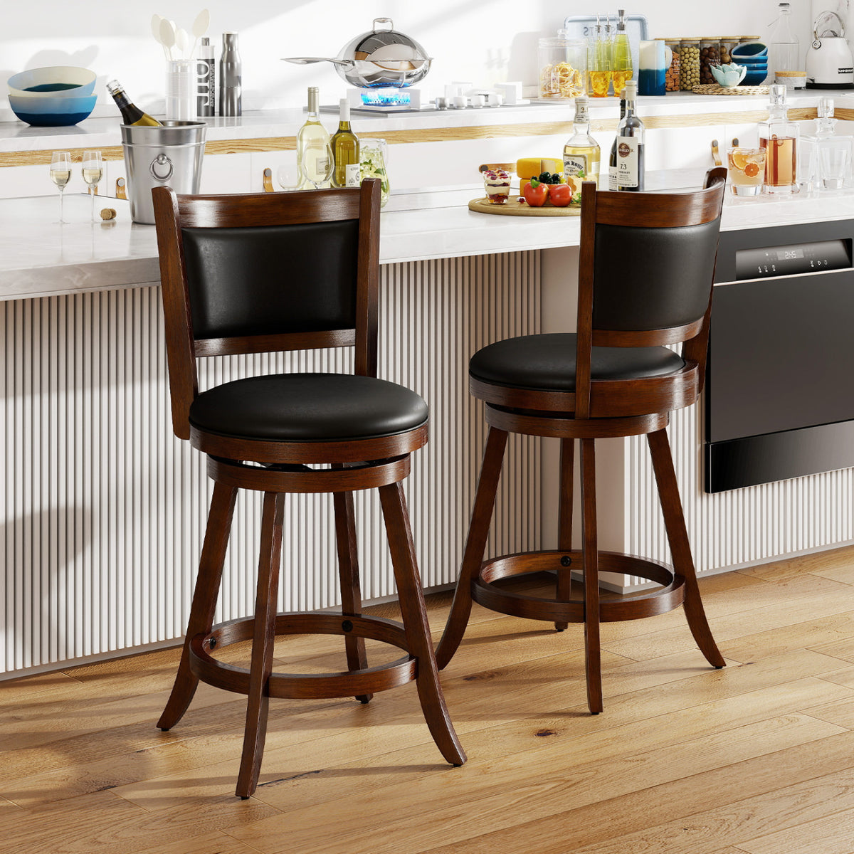 Two dark wood counter stools with black seats at a bright kitchen island.