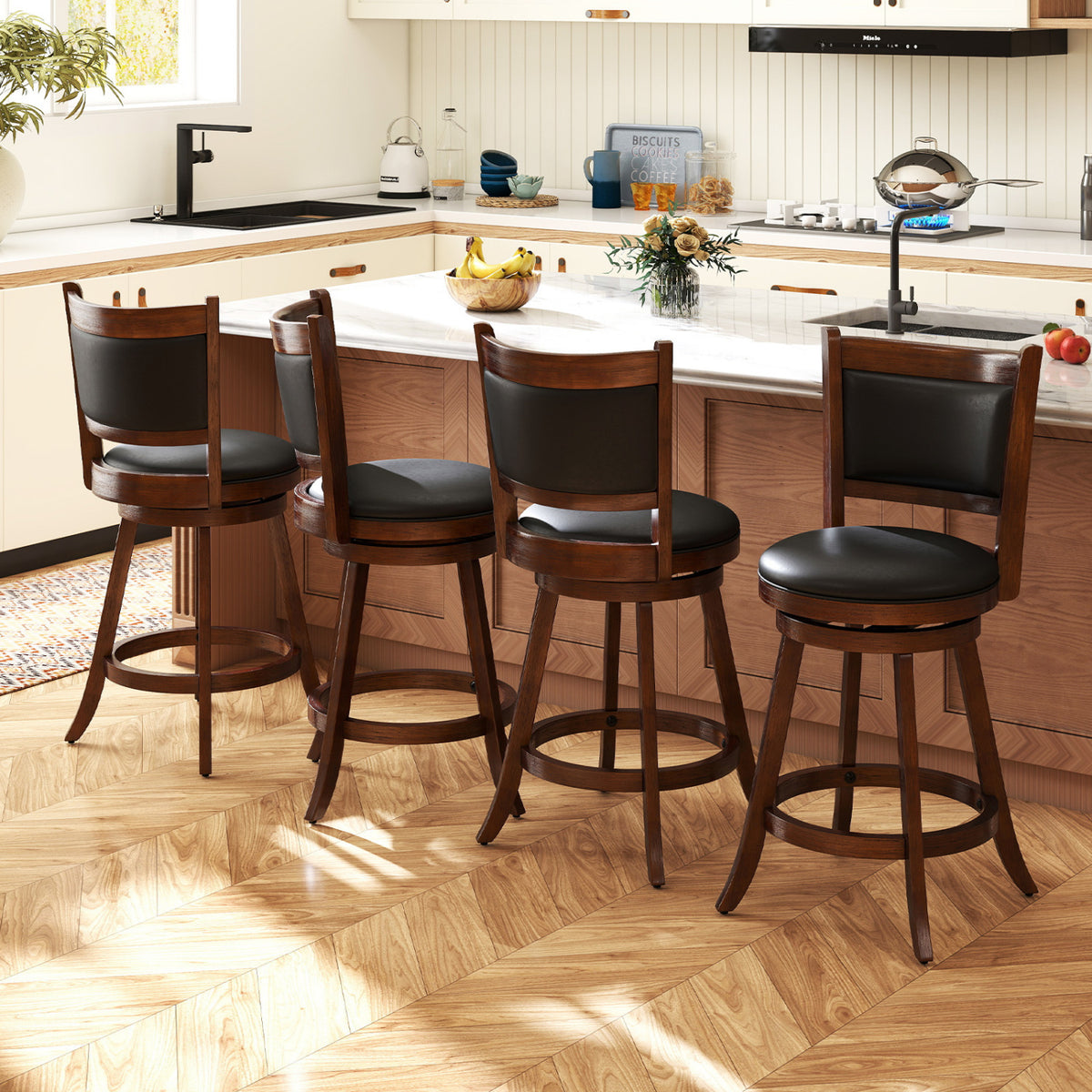 Four dark wood counter stools with black padded seats arranged around a kitchen island.