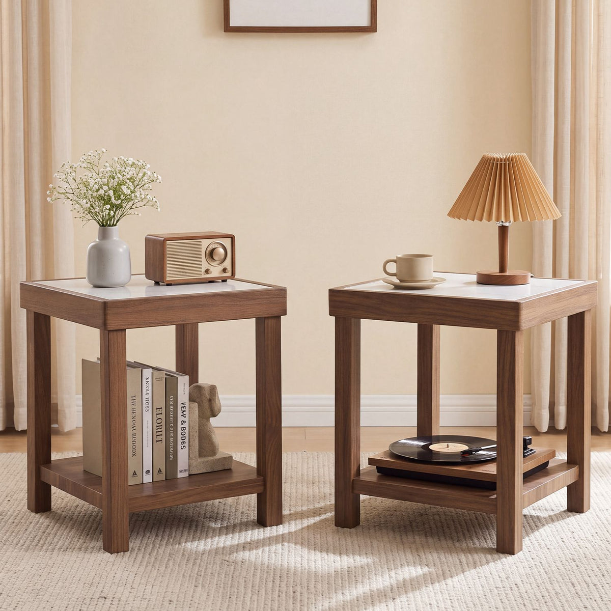Two brown square side tables with pale tops and lower shelves stand beside each other in a softly lit room.