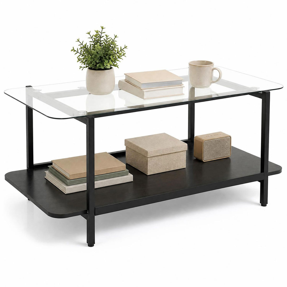 Angled black two-tier coffee table with clear glass top and decor on both levels