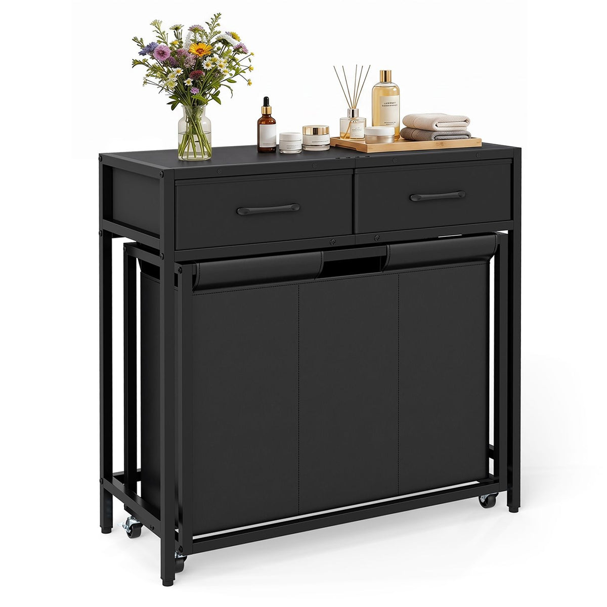 Angled view of a black laundry console with closed fabric compartments, two drawers, and bathroom accessories on top.