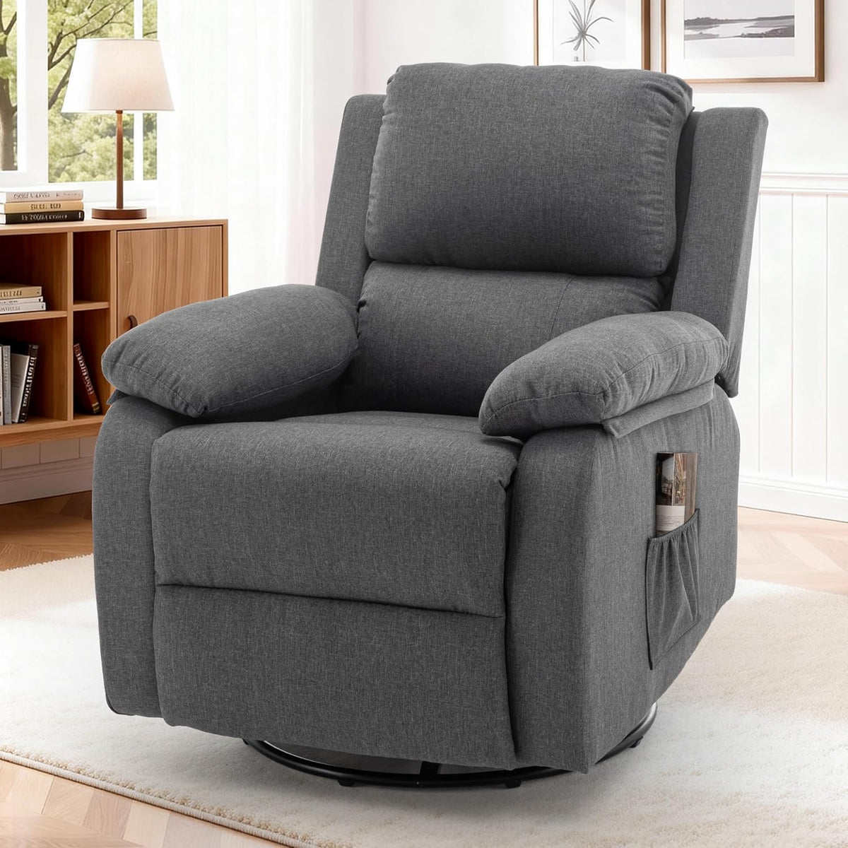 Three-quarter front view of the gray swivel recliner with visible side pocket, placed in a light living room setting.