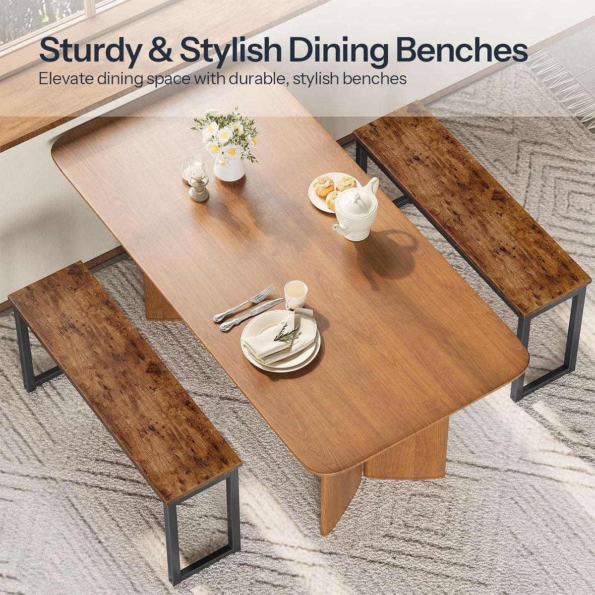 Overhead view of a dining table flanked by two rustic brown benches showing wood-look tops and black metal legs