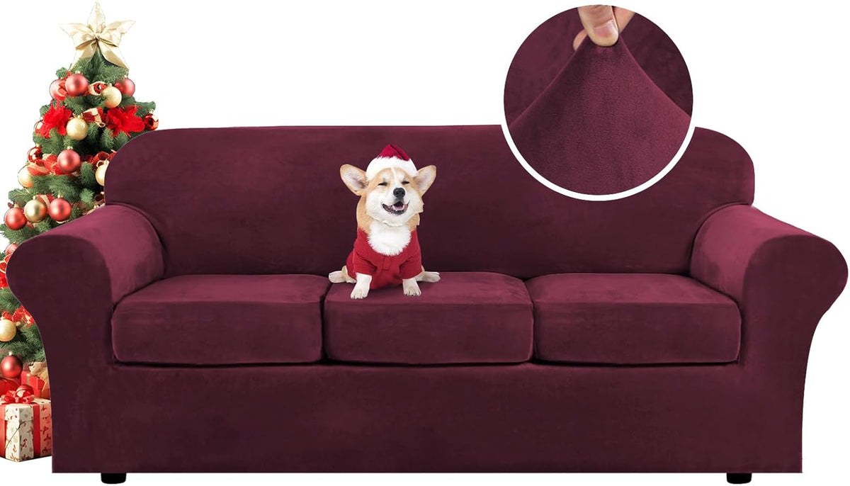 Front view of a deep wine-colored three-cushion sofa with a small Christmas tree and wrapped gifts at the left; round inset