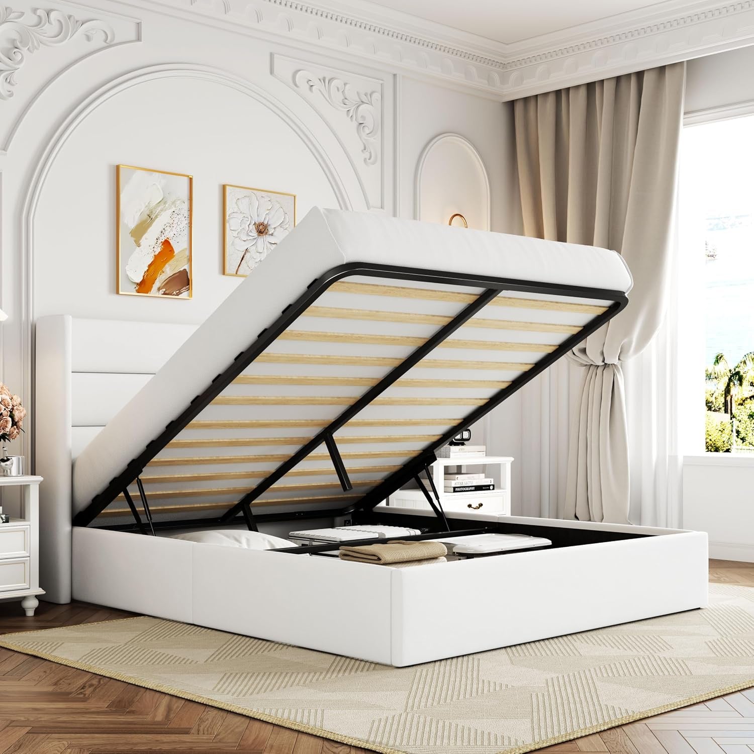 White upholstered storage bed with headboard panels and raised slatted frame exposing storage area.