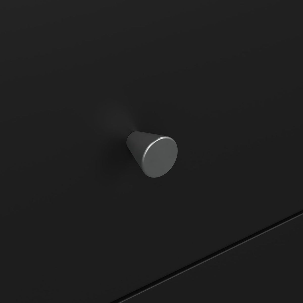 Close-up detail of a small pewter-colored conical drawer knob mounted on a black drawer front