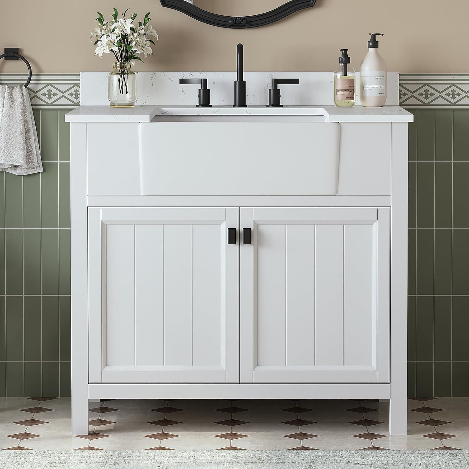 White bathroom vanity with apron-front sink, quartz backsplash and black faucet