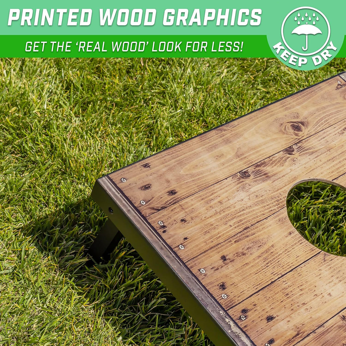 Close-up of cornhole board top showing printed barnwood-style graphics, screw details and grass background