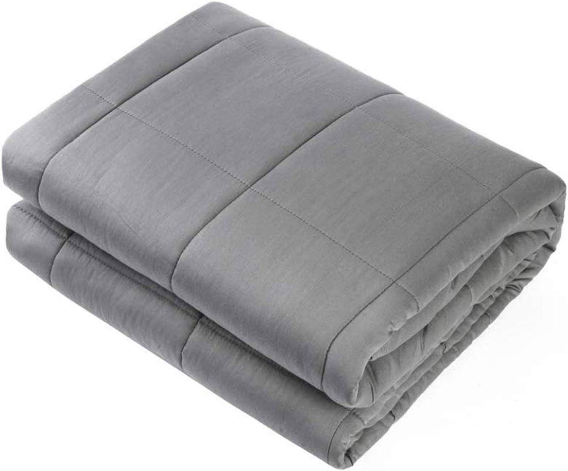 Folded dark grey weighted blanket showing quilted grid and soft fabric on a white background