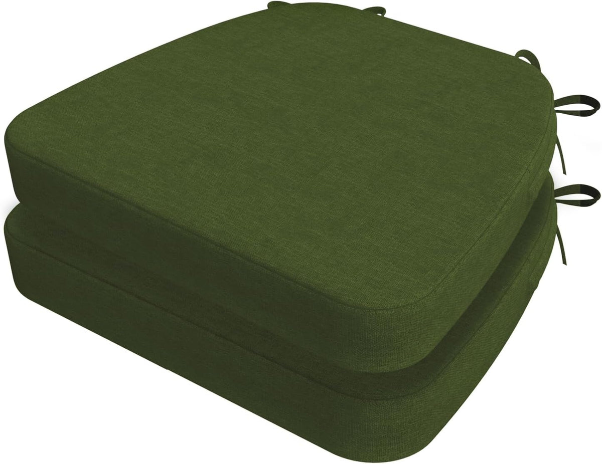 Two dark green D-shaped chair cushions stacked, angled to show top surface and rear tie loops