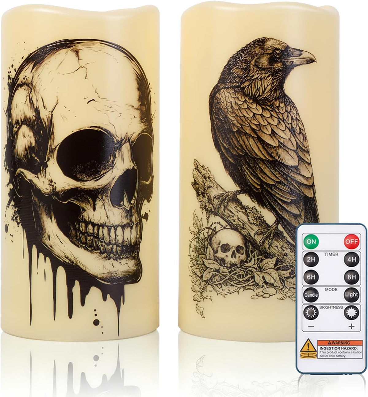 Close-up front view of two ivory pillar candles printed with a dripping skull and a perched raven; remote at lower right.