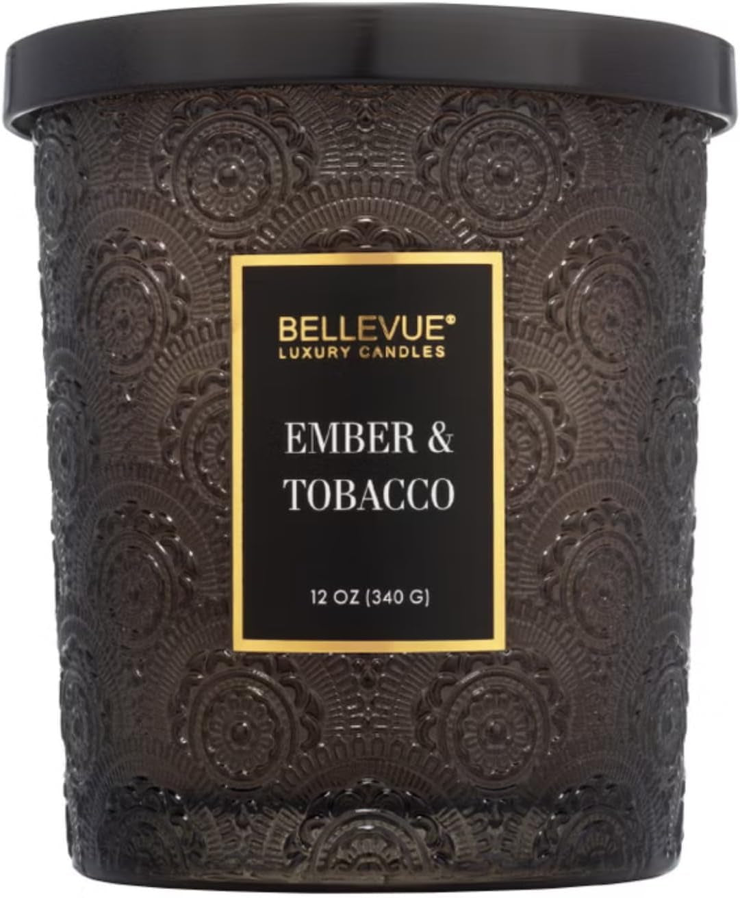 Close-up front view of a dark brown embossed glass jar candle with black lid and centered label