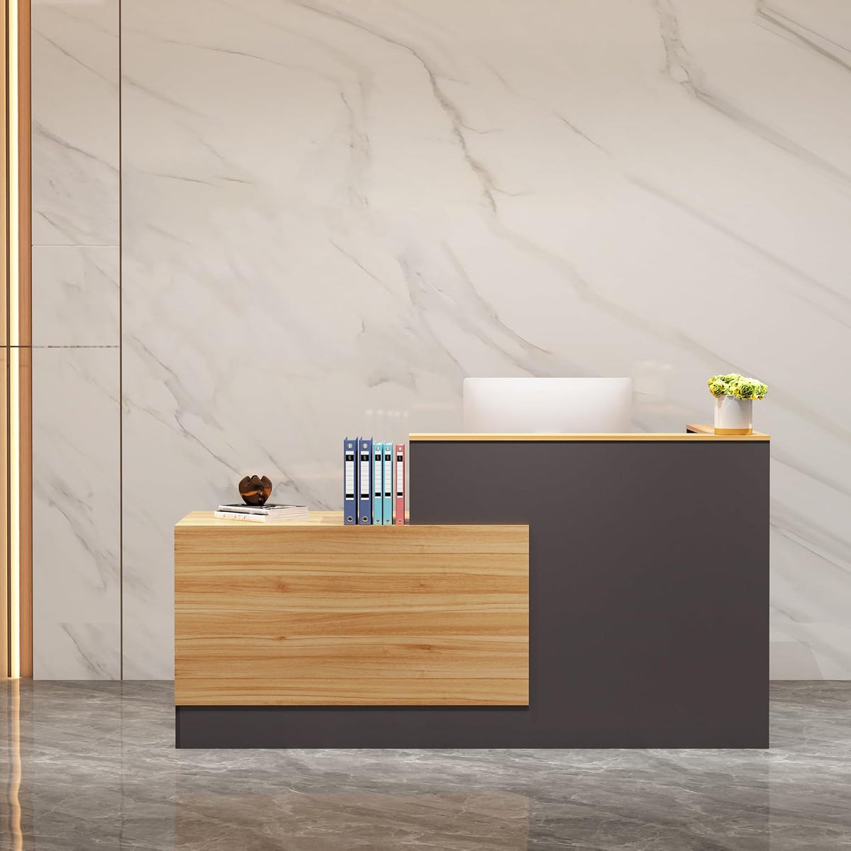 Straight-on view of a dark gray reception desk with light wood front accent and folders on top.