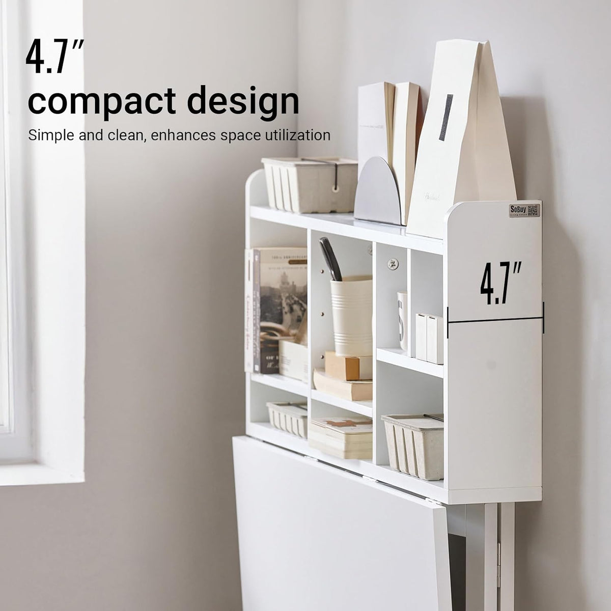 Close-up of white multi-compartment shelf showing adjustable cubbies and rounded edges
