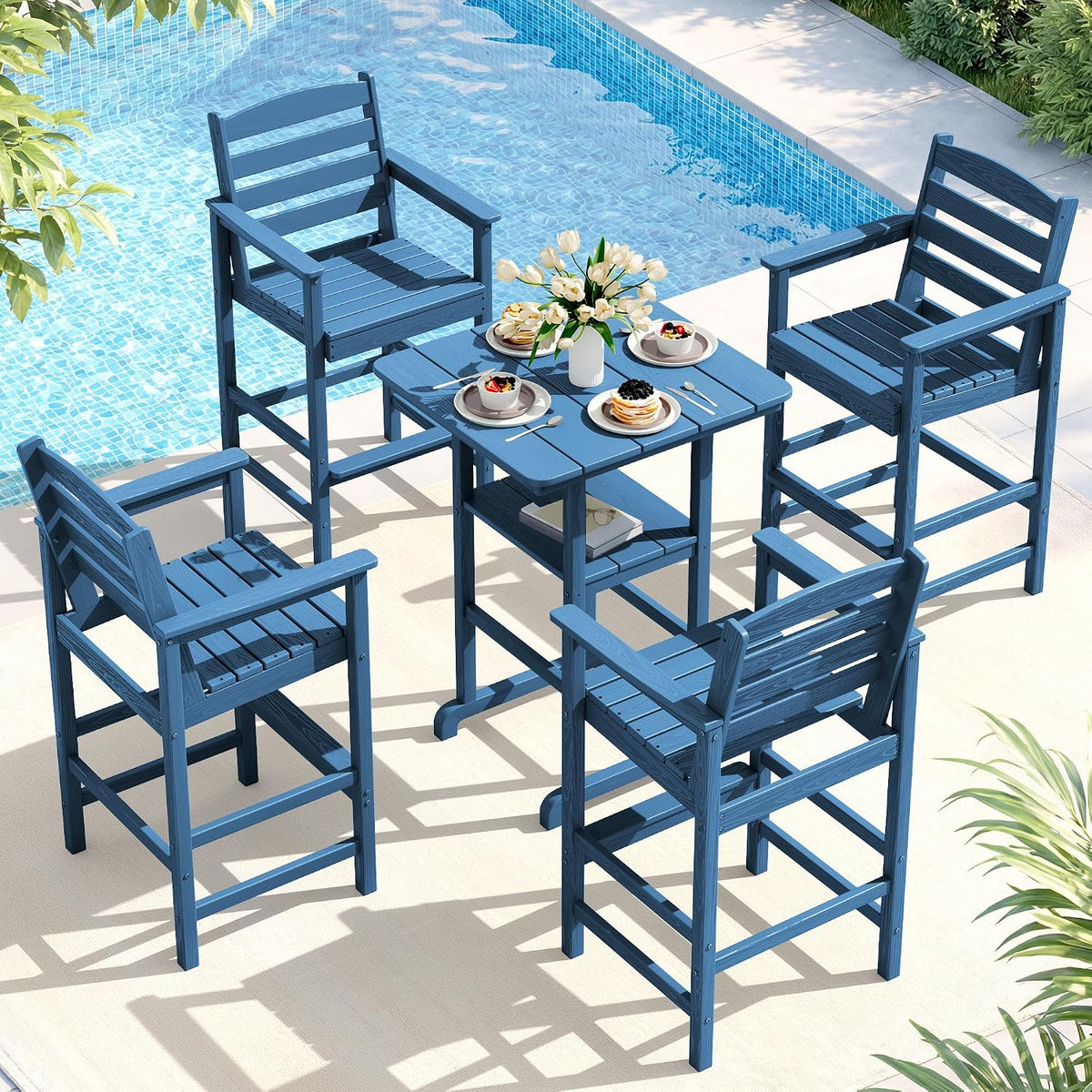 Four high-back bar chairs around a small square table beside a pool, blue plank-style slatted design.