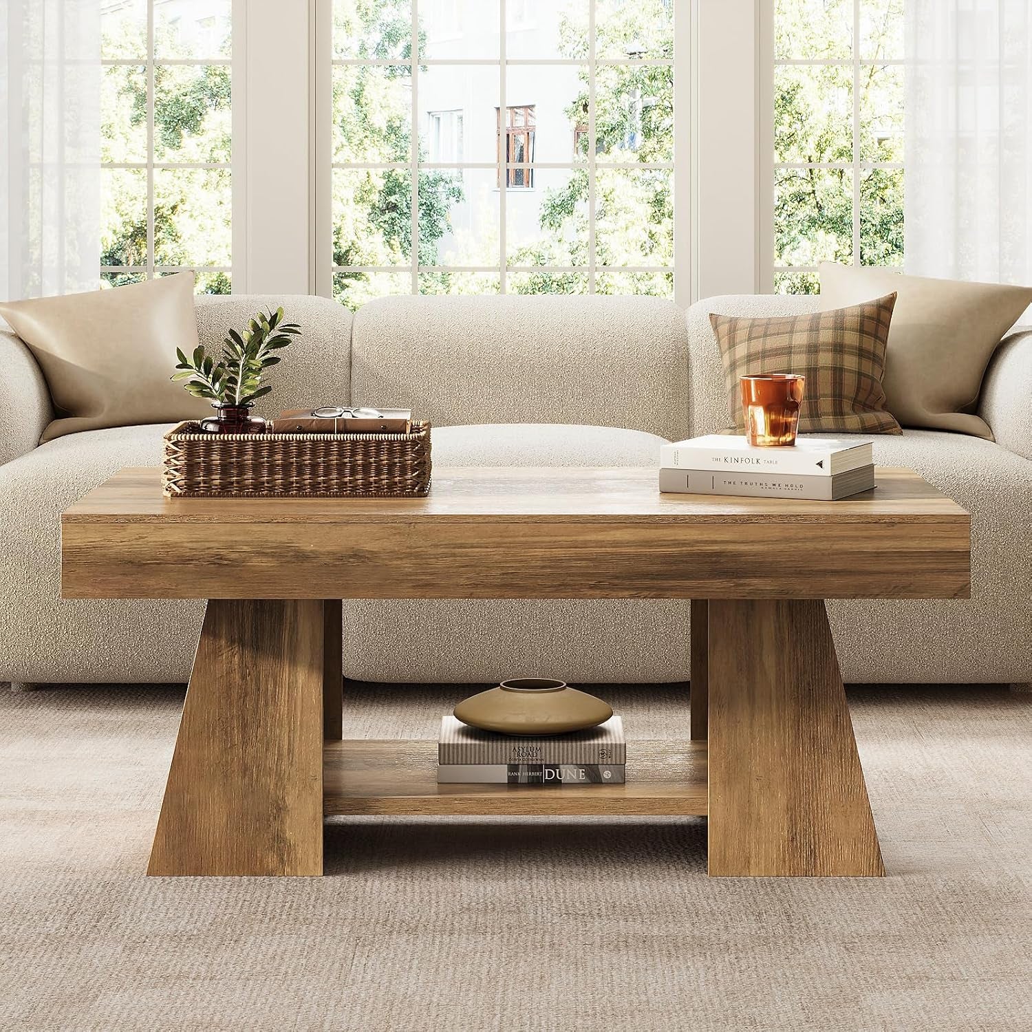 Straight-on front view of the rectangular coffee table in a neutral living room setting