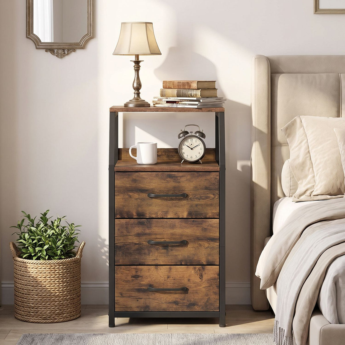 Rustic brown three-drawer nightstand with an open shelf beside a bed, topped with a lamp and books.