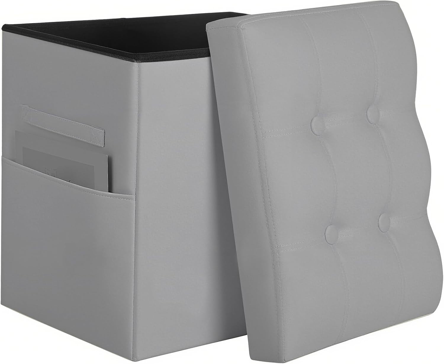 Box-shaped storage ottoman with lid removed, gray exterior, side pocket holding flat items and tufted lid leaning against it
