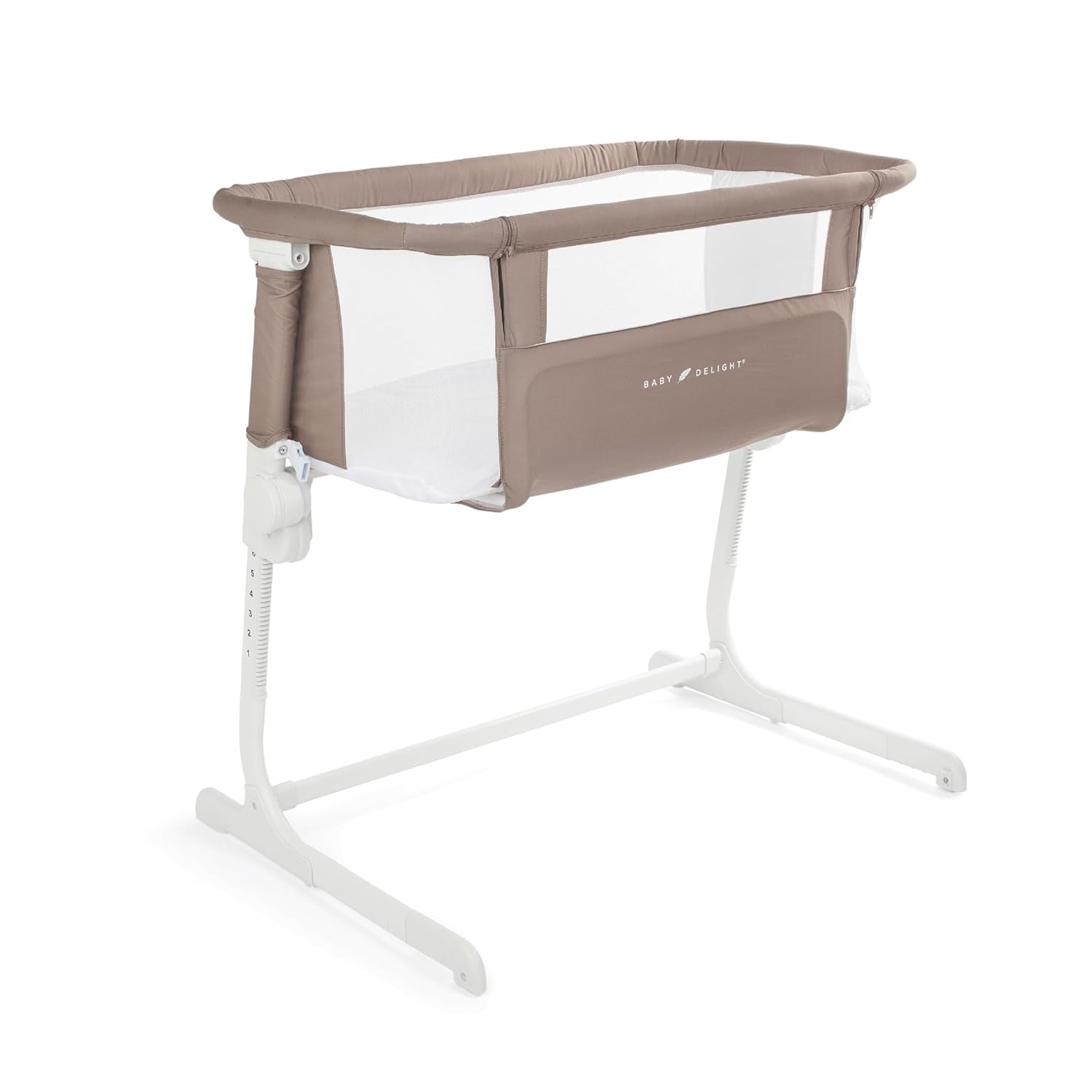 Taupe bedside bassinet with mesh panels and white base, angled to show height adjustment